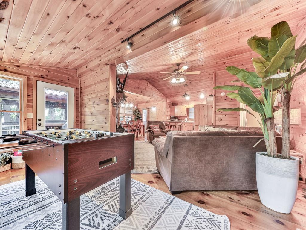 189 Smith Hill Road Blue Ridge, GA 30513 - Photo 13 of 29 a living room with couches coffee table and chairs with wooden floor