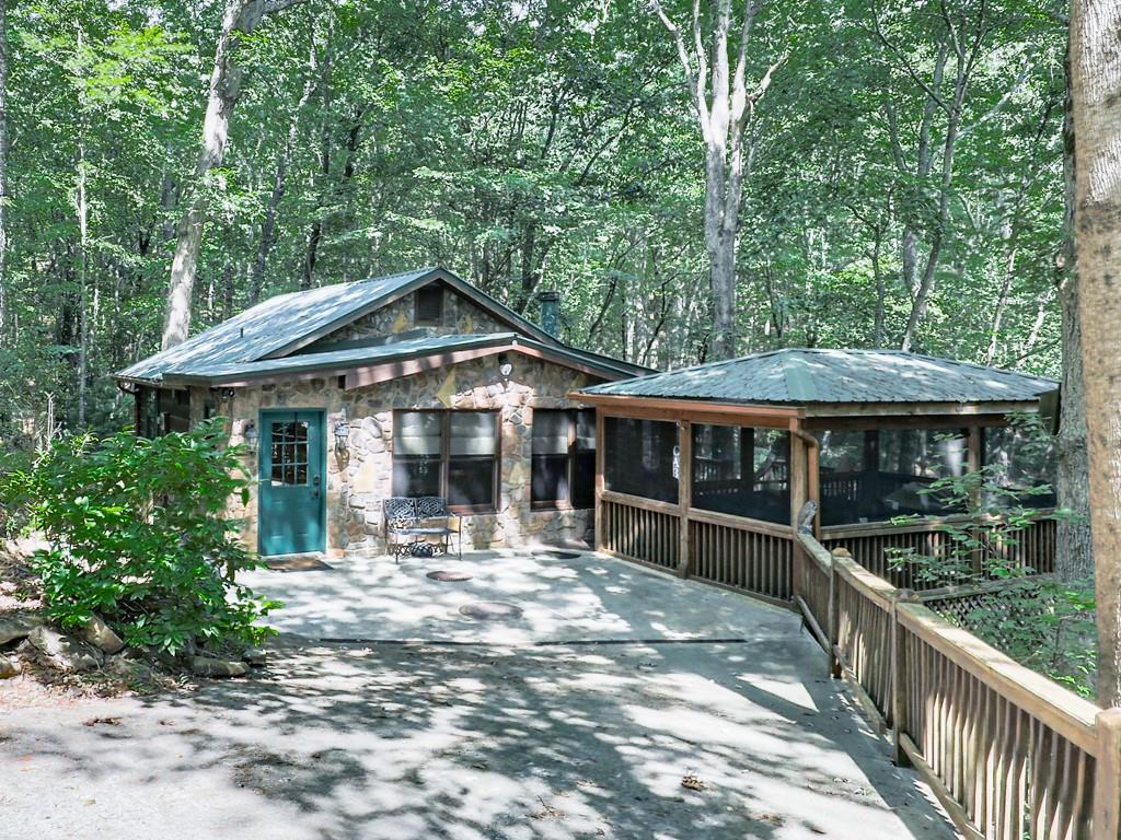 189 Smith Hill Road Blue Ridge, GA 30513 - Photo 29 of 29 a front view of a house with garden