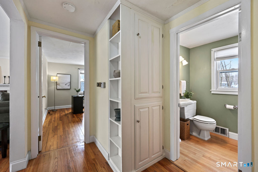 9 Barry Lane Simsbury, CT 06070 - Photo 13 of 28 a bathroom with a toilet sink a shower and a mirror