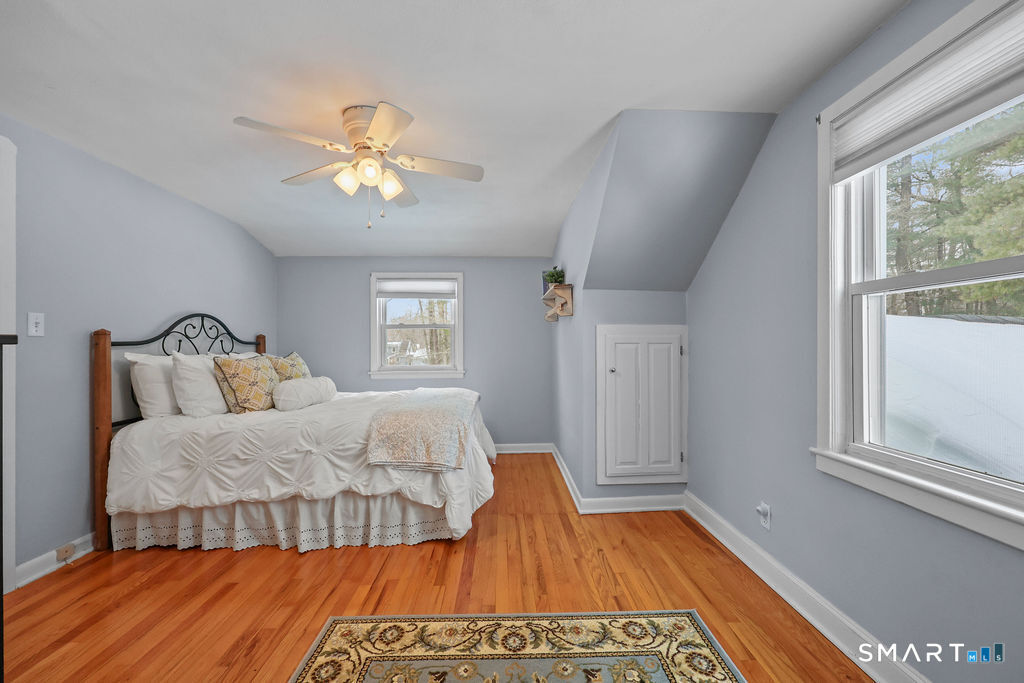 9 Barry Lane Simsbury, CT 06070 - Photo 21 of 28 a bedroom with a bed and a window