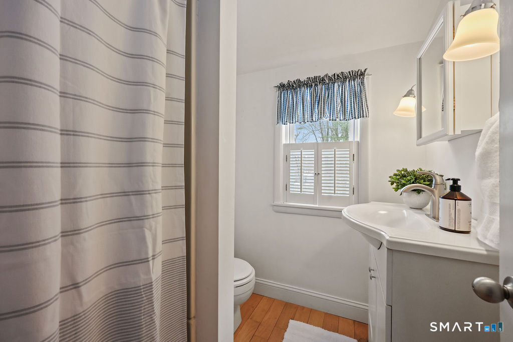 9 Barry Lane Simsbury, CT 06070 - Photo 23 of 28 a bathroom with a sink toilet and shower