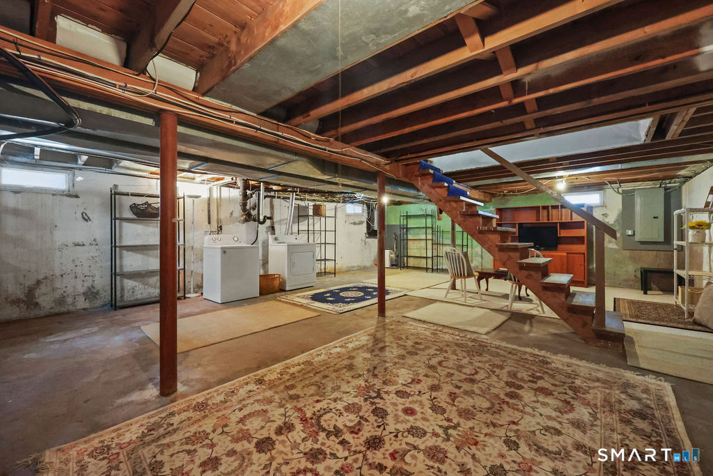 9 Barry Lane Simsbury, CT 06070 - Photo 25 of 28 a view of a room with wooden floor