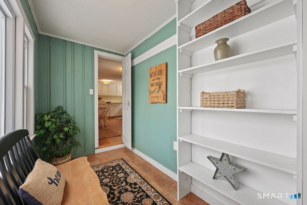 9 Barry Lane Simsbury, CT 06070 - Photo 27 of 28 a bathroom with a sink and a mirror