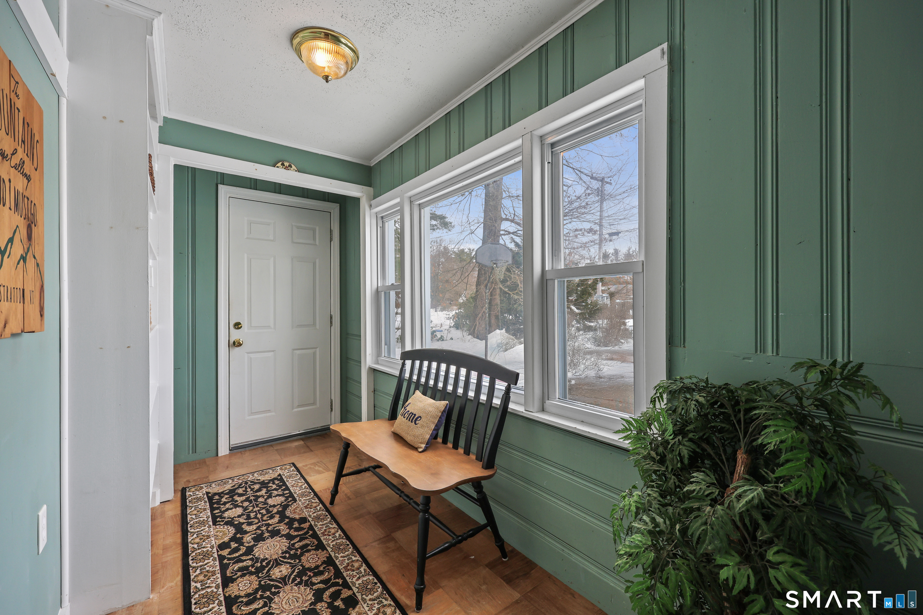 9 Barry Lane Simsbury, CT 06070 - Photo 28 of 28 a view of a porch with furniture and a yard