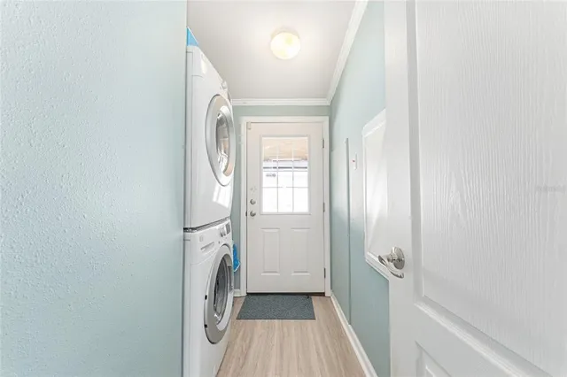 a view of hallway with washer and dryer