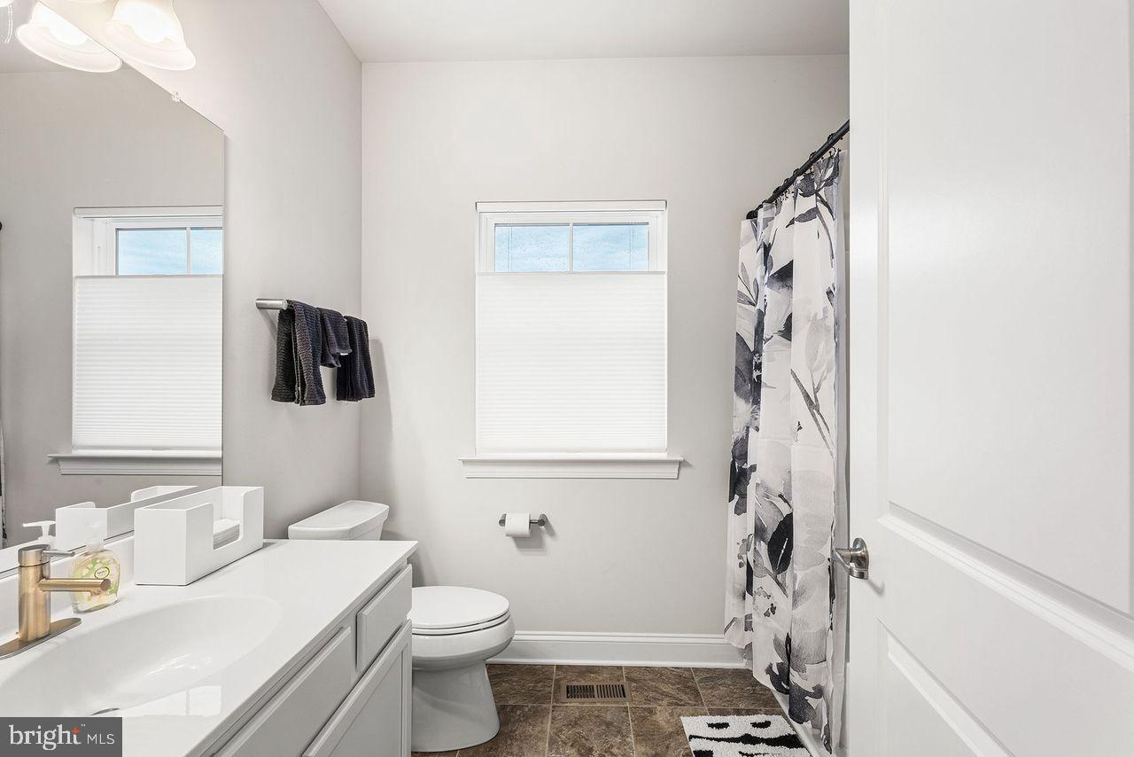 183 Galena Road Frederica, DE 19946 - Photo 41 of 46 Shared 2nd Bath On Main Level In Between Rooms