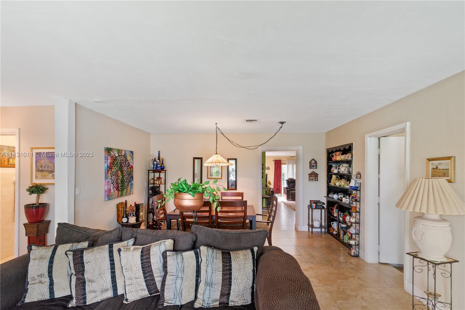 Hialeah Hialeah, FL 33012 - Photo 11 of 40 a view of a livingroom with furniture and window