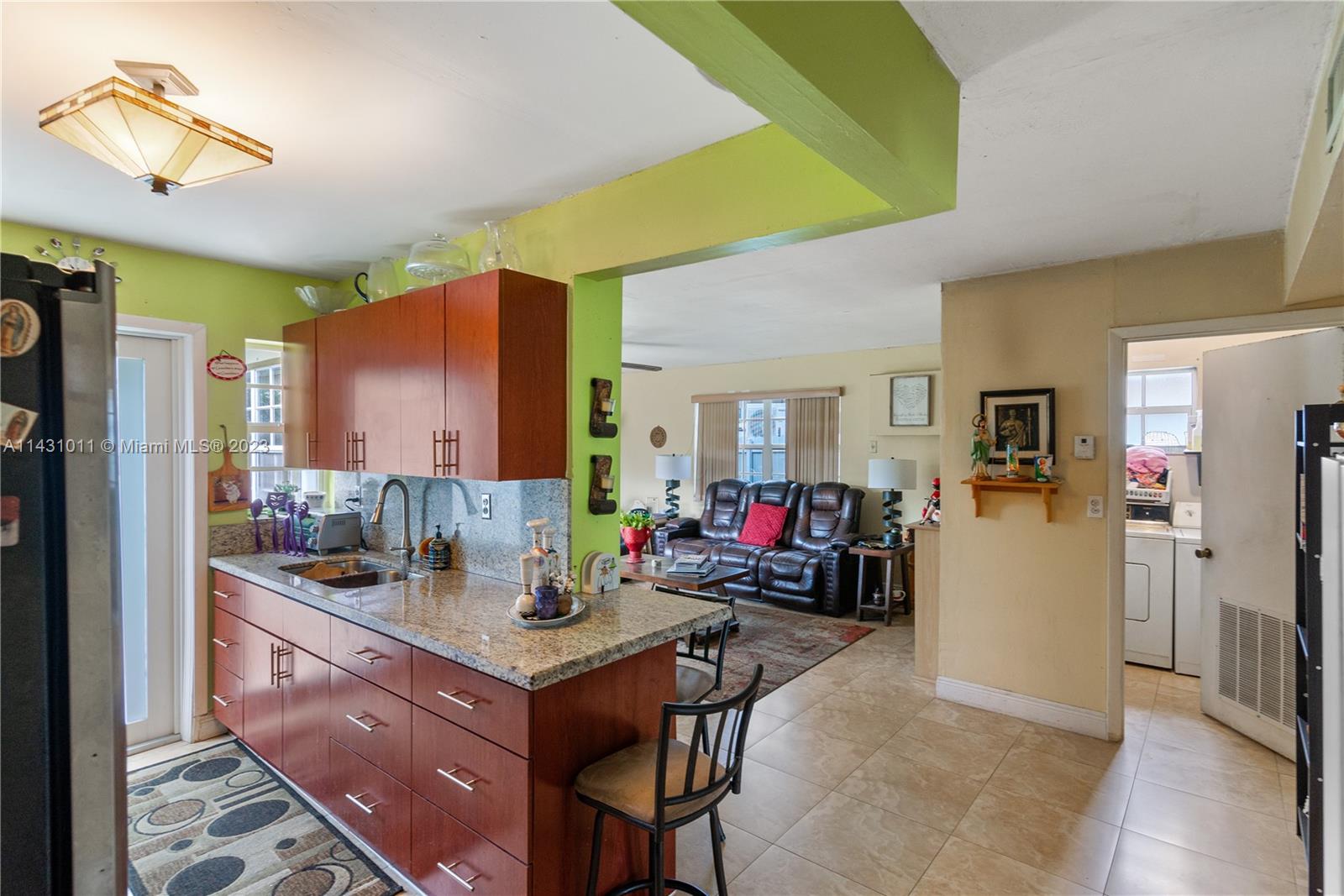 Hialeah Hialeah, FL 33012 - Photo 19 of 40 a kitchen with a sink cabinets and appliances