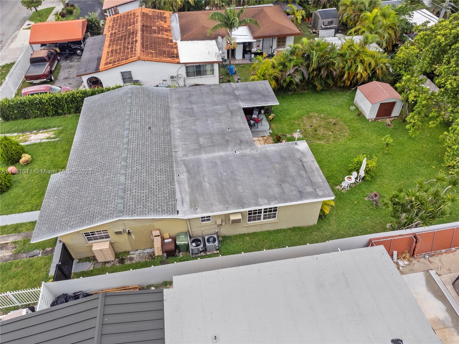 Hialeah Hialeah, FL 33012 - Photo 35 of 40 an aerial view of a house with garden space and street view