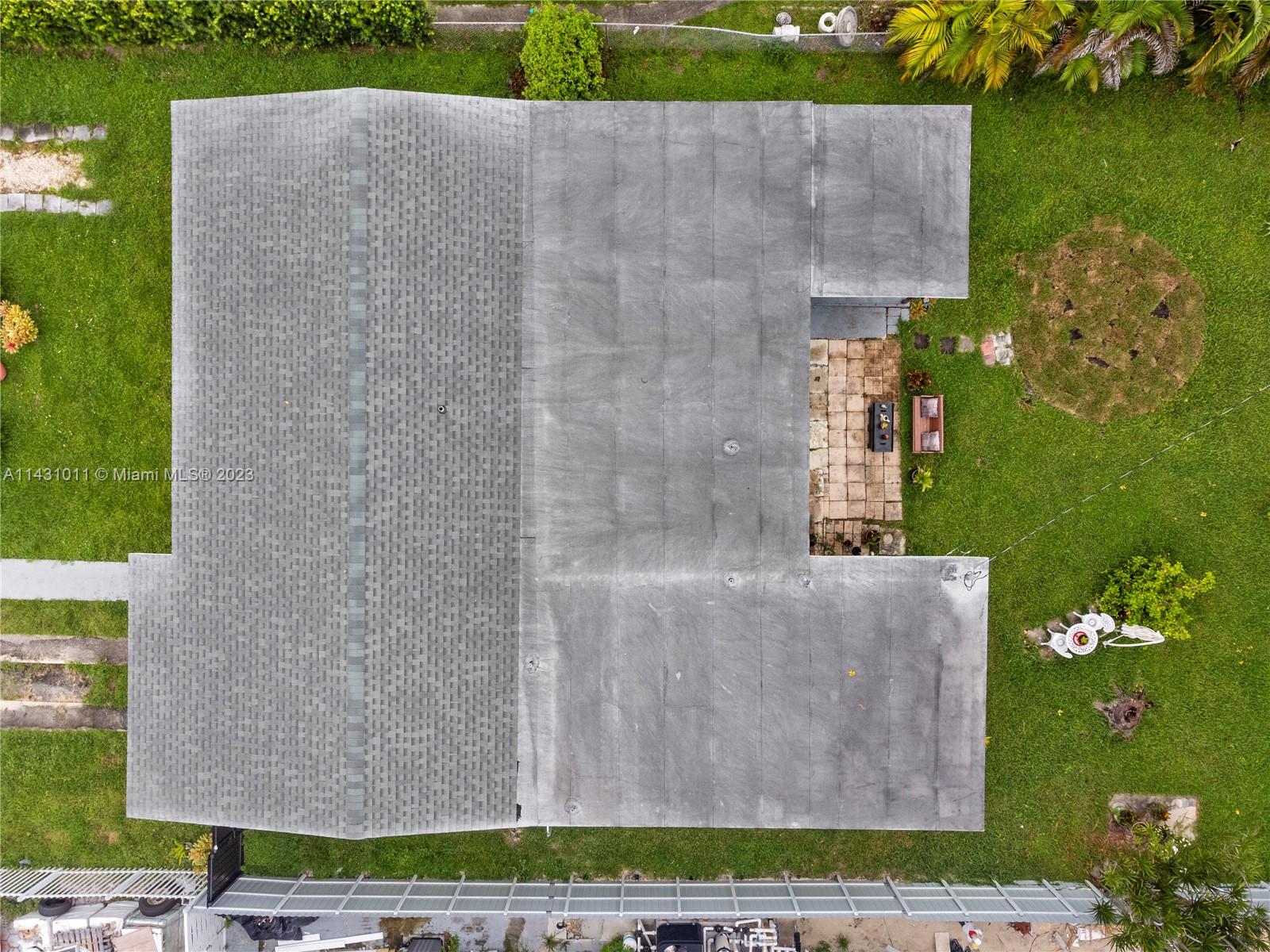 Hialeah Hialeah, FL 33012 - Photo 36 of 40 an aerial view of a house with a yard