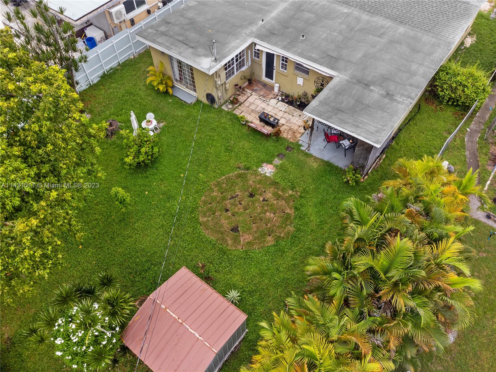 Hialeah Hialeah, FL 33012 - Photo 38 of 40 an aerial view of residential house with an outdoor space and seating
