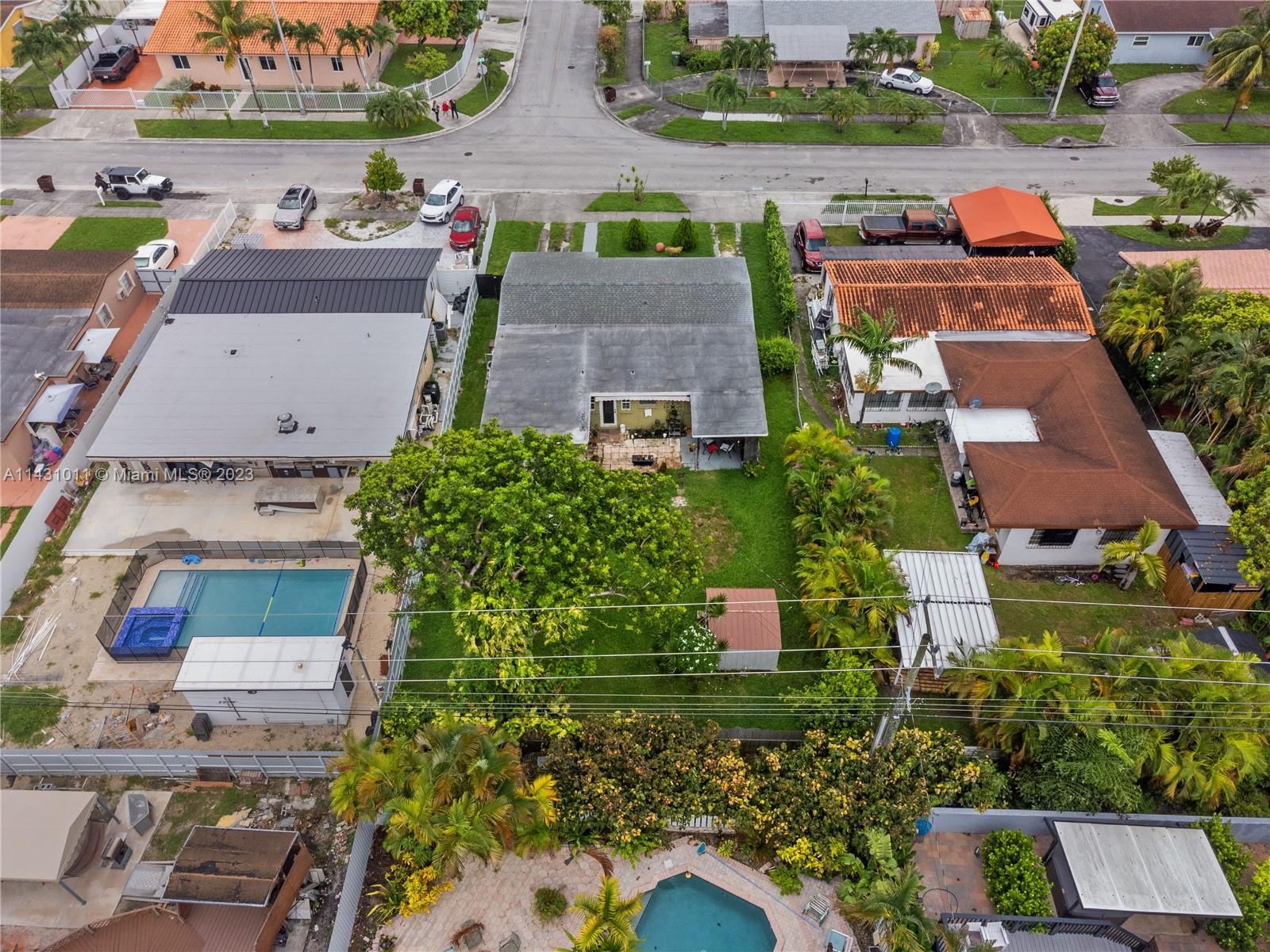 Hialeah Hialeah, FL 33012 - Photo 39 of 40 an aerial view of a house with a yard