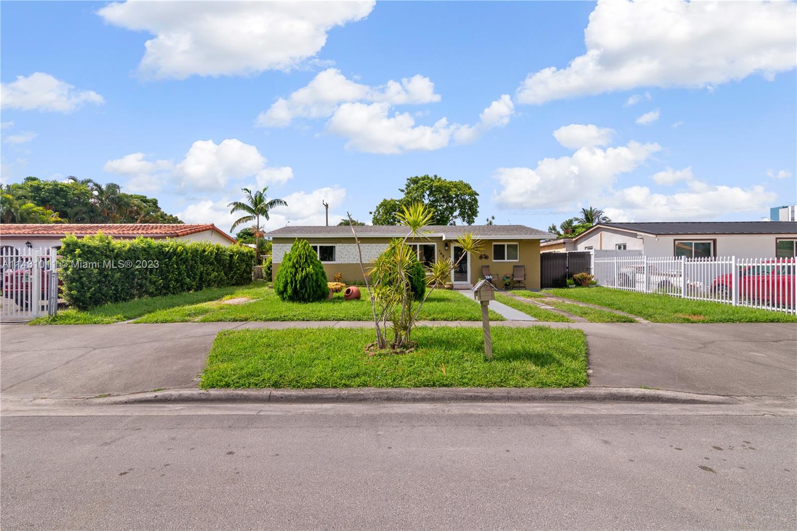 Hialeah Hialeah, FL 33012 - Photo 4 of 40 front view of house with a yard