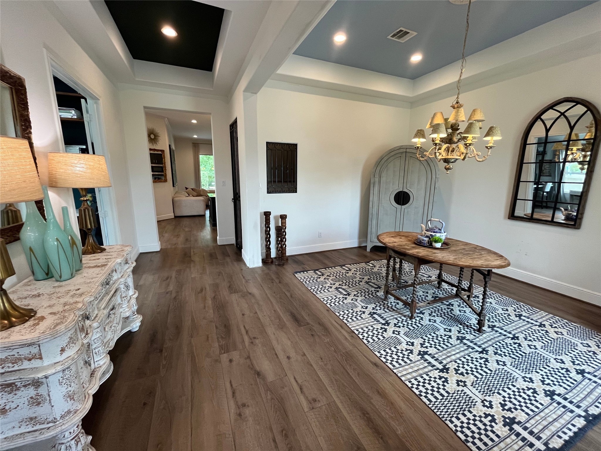 10082 Preserve Way Conroe, TX 77385 - Photo 15 of 47 a living room with furniture and a chandelier