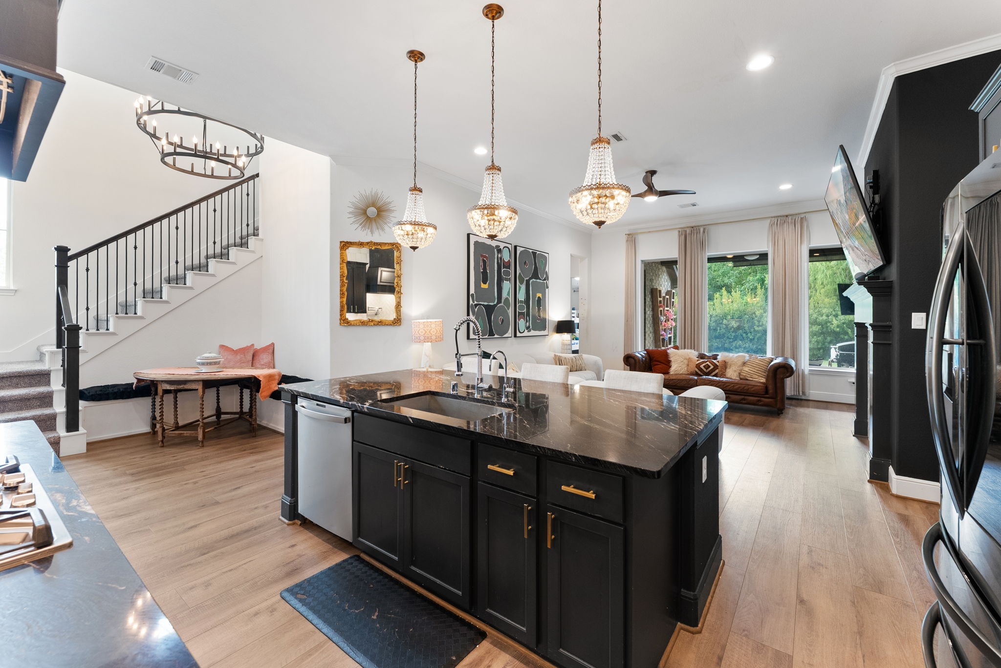 10082 Preserve Way Conroe, TX 77385 - Photo 19 of 47 a kitchen with sink stove and cabinets