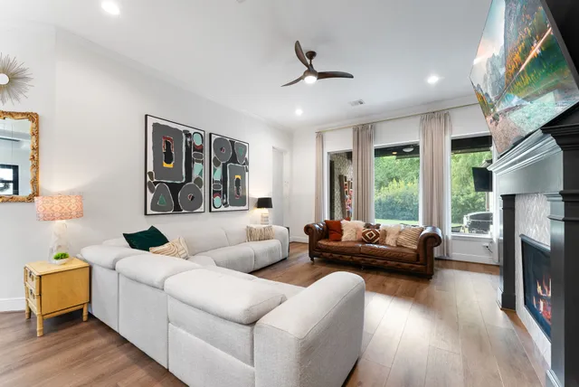 a bathroom with a tub and a mirror