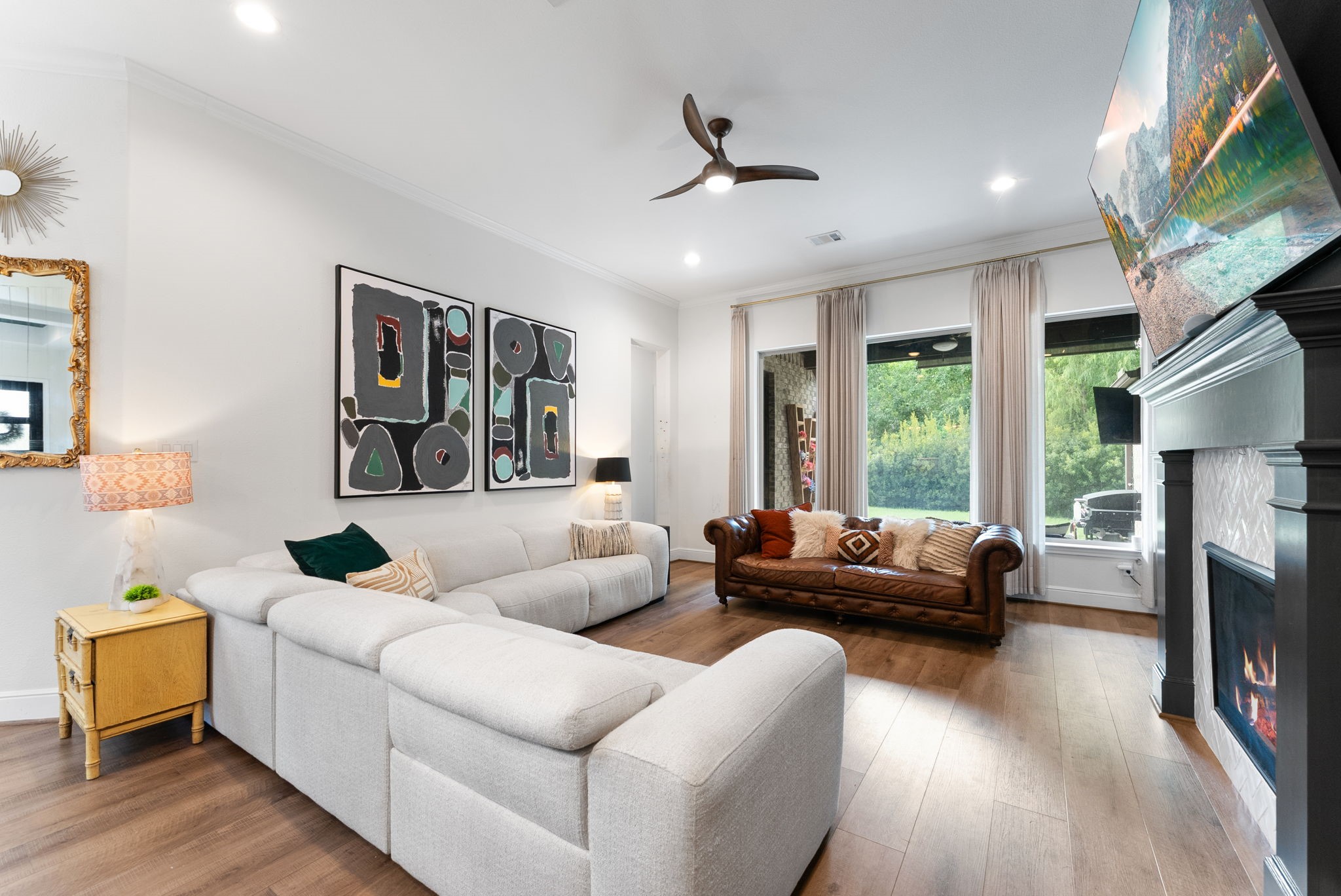 10082 Preserve Way Conroe, TX 77385 - Photo 20 of 47 a living room with furniture and a flat screen tv