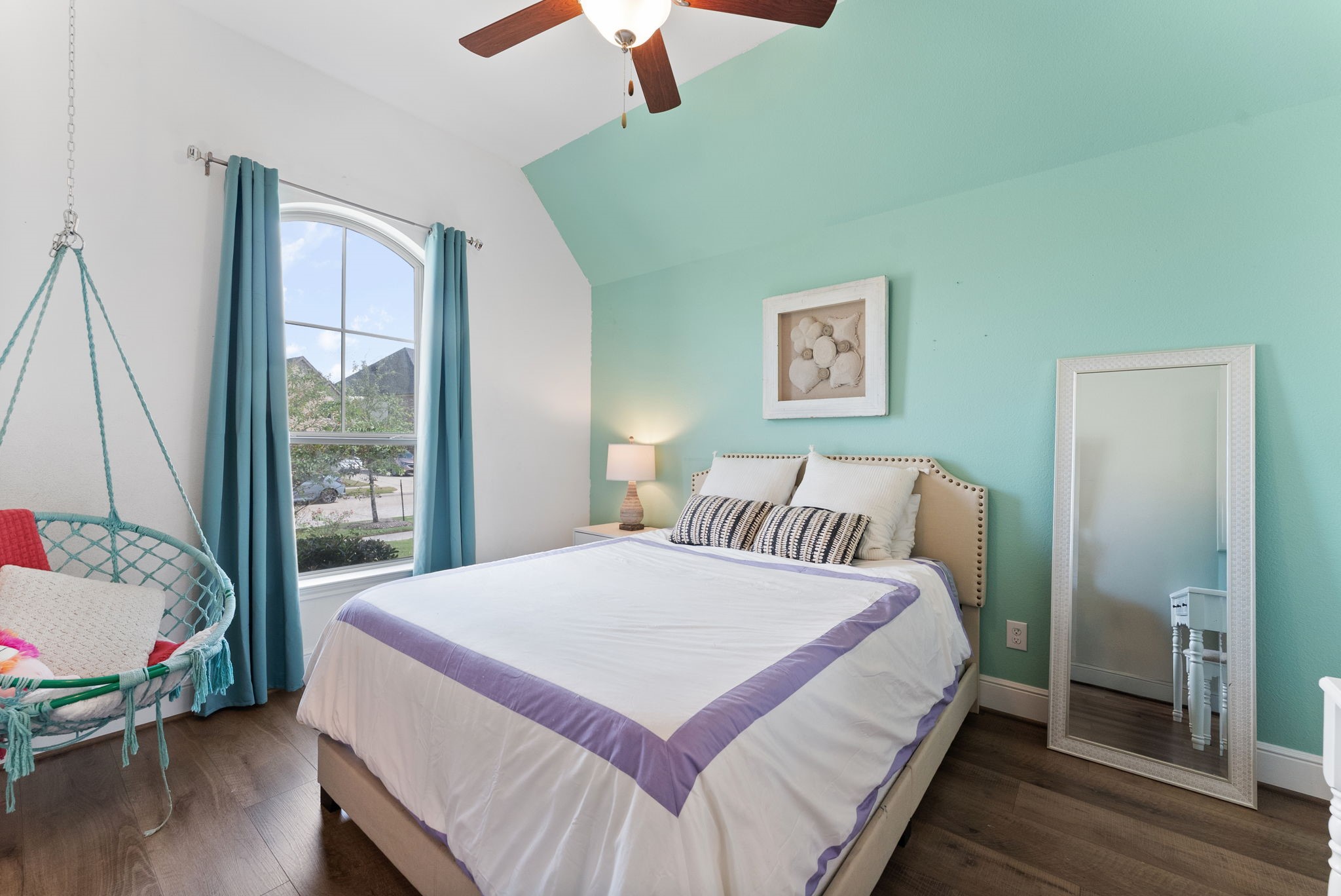 10082 Preserve Way Conroe, TX 77385 - Photo 5 of 47 a bedroom with a bed and a large window