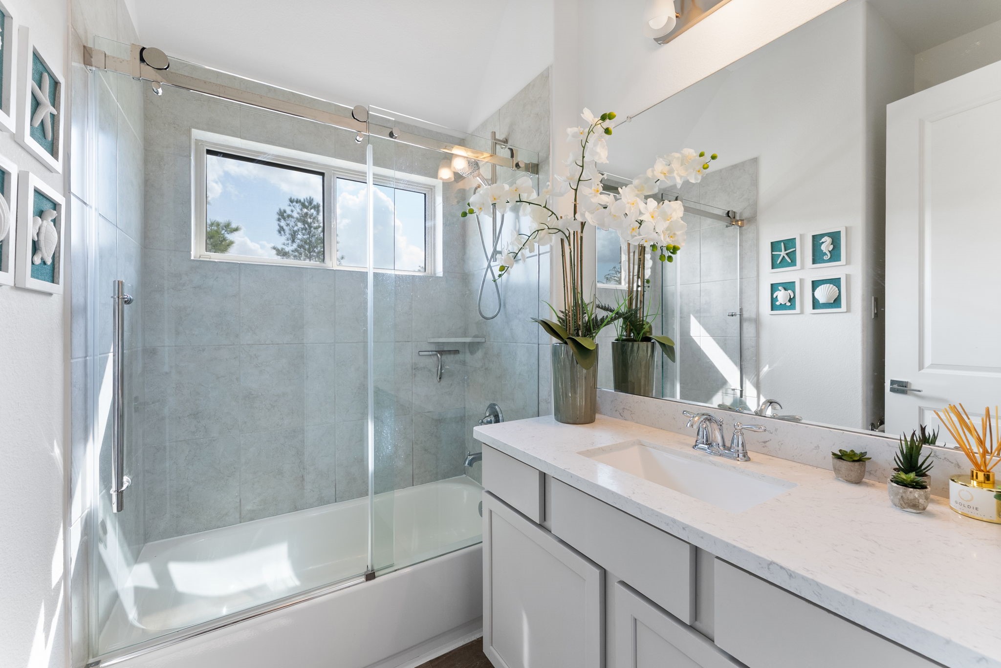 10082 Preserve Way Conroe, TX 77385 - Photo 6 of 47 a bathroom with a shower sink and mirror