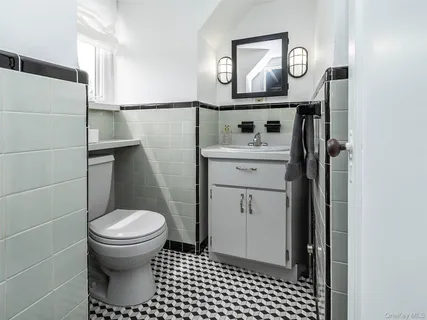 a bathroom with a sink and a toilet