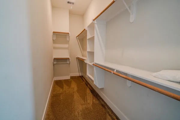 a view of balcony with wooden floor