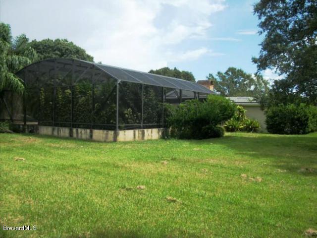 2740 Turtle Mound Road Melbourne, FL 32934 - Photo 12 of 16 a view of a garden