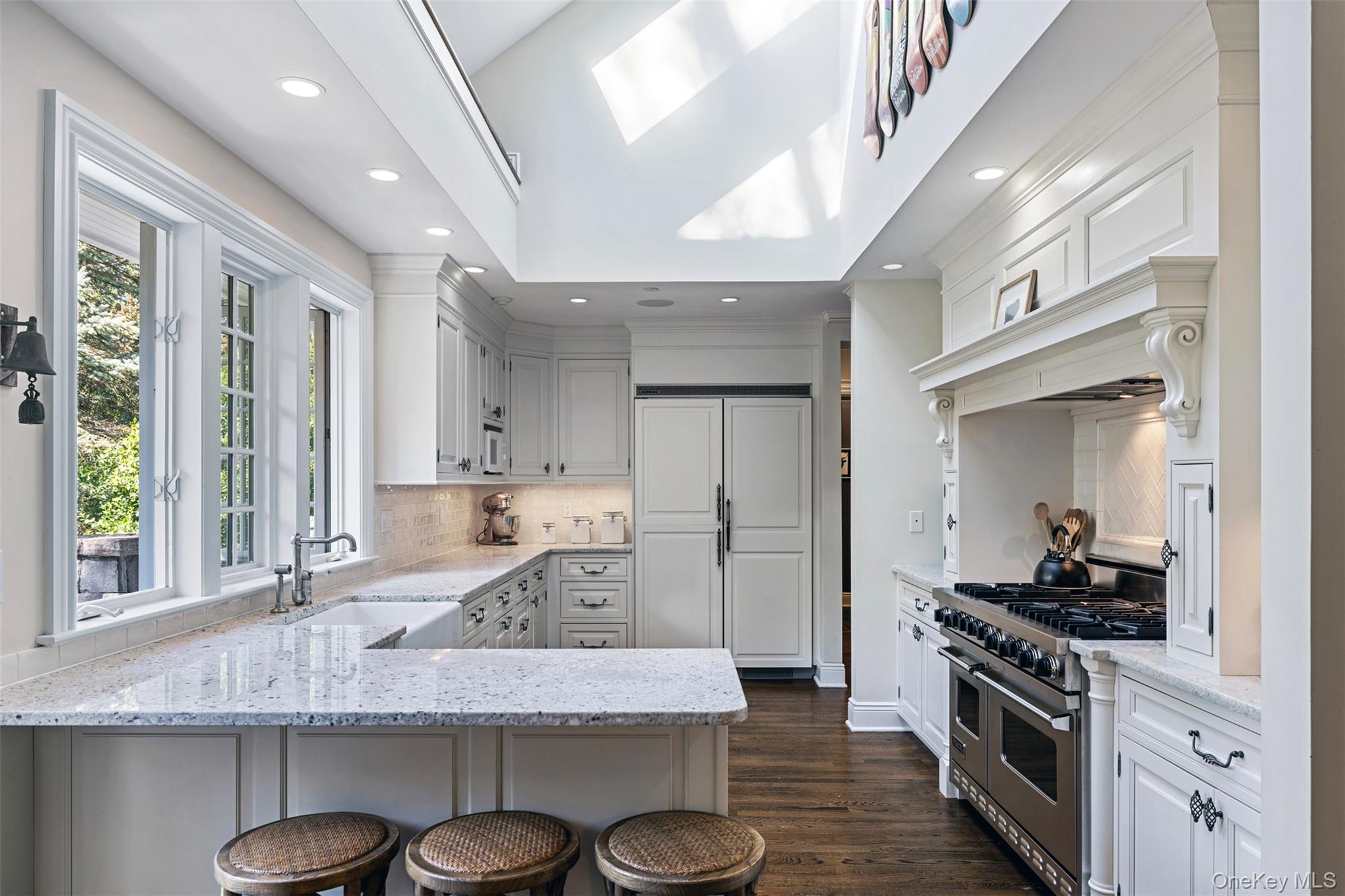 12 Bishop Park Road Pound Ridge, NY 10576 - Photo 11 of 49 a kitchen with stainless steel appliances granite countertop a sink a stove and a wooden floors