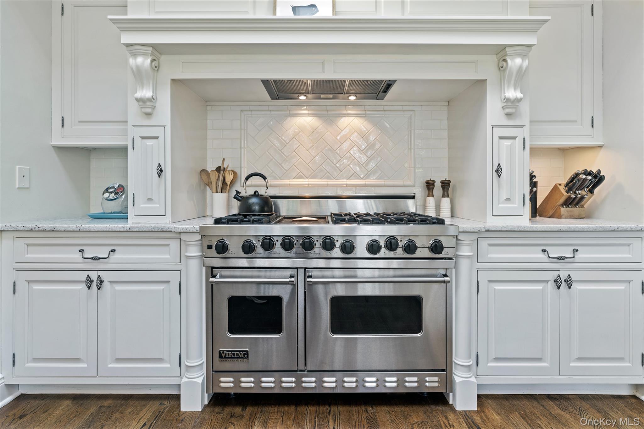 12 Bishop Park Road Pound Ridge, NY 10576 - Photo 15 of 49 a stove top oven sitting inside of a kitchen