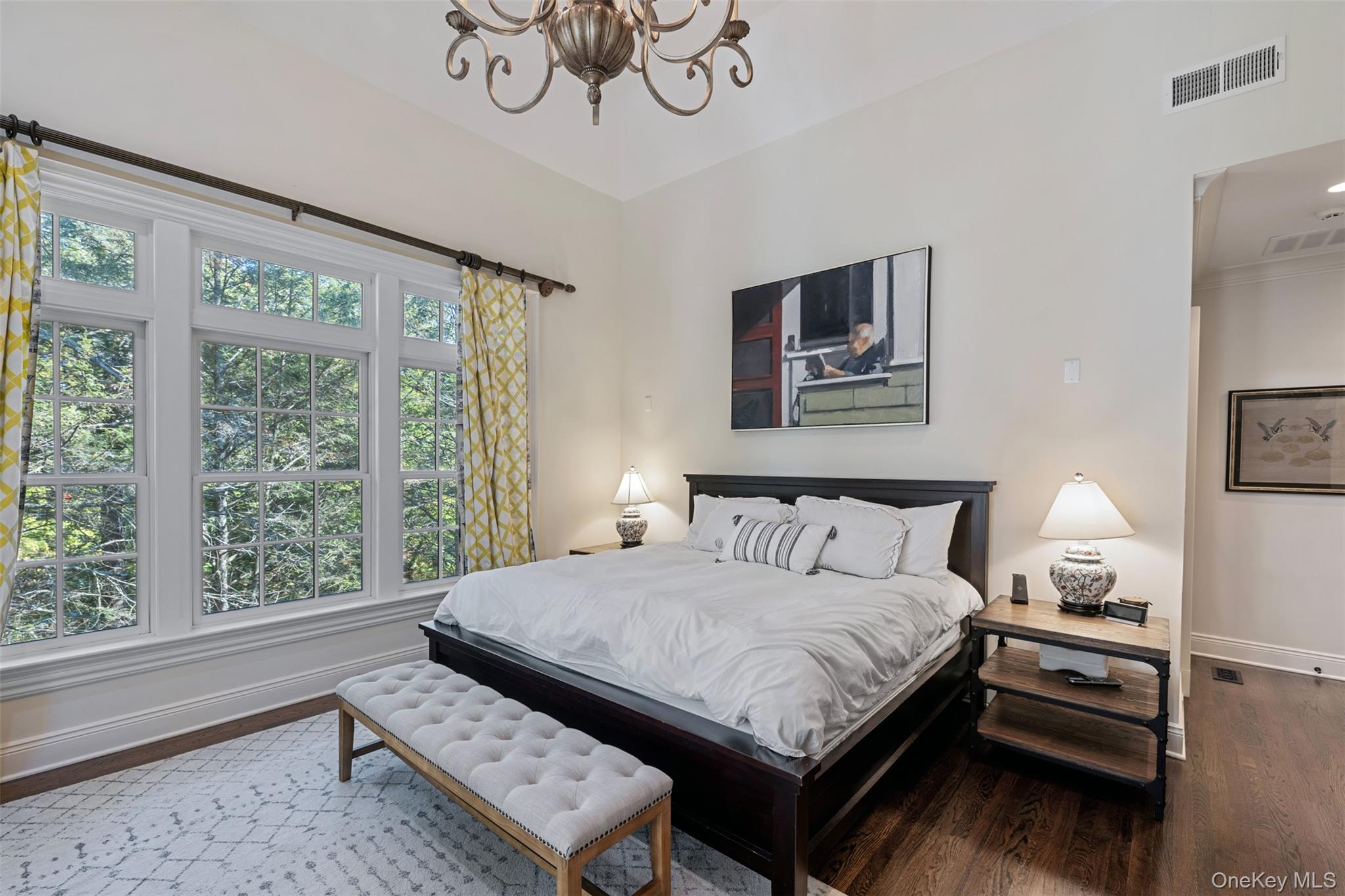 12 Bishop Park Road Pound Ridge, NY 10576 - Photo 20 of 49 a bedroom with a bed painting on wall and a large window