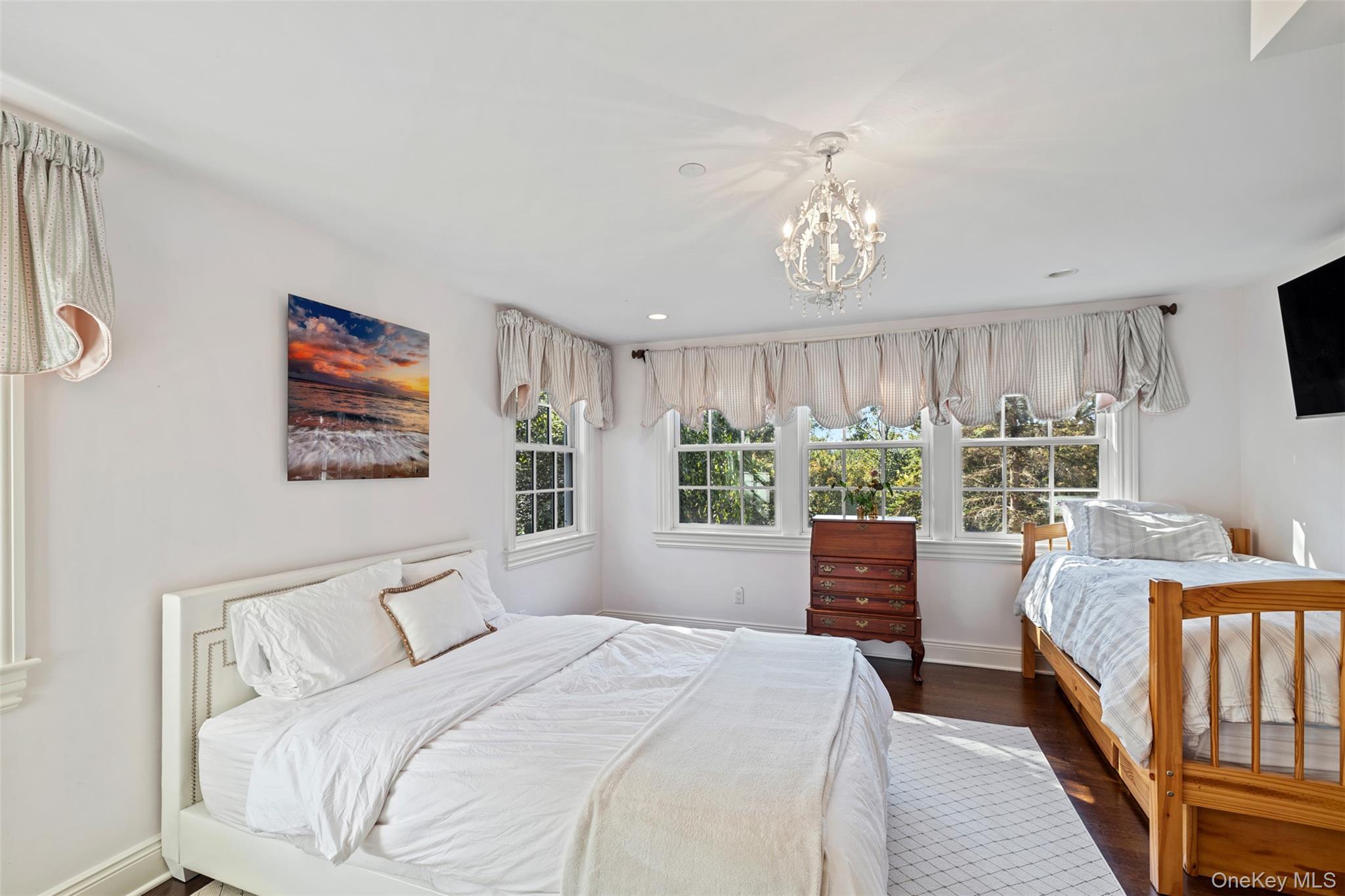 12 Bishop Park Road Pound Ridge, NY 10576 - Photo 25 of 49 a bedroom with a bed and a large window