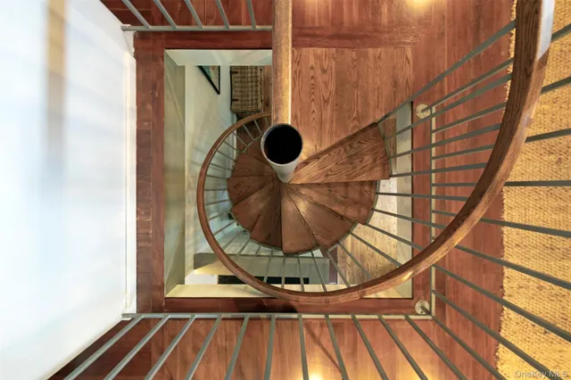 a view of entryway with wooden floor