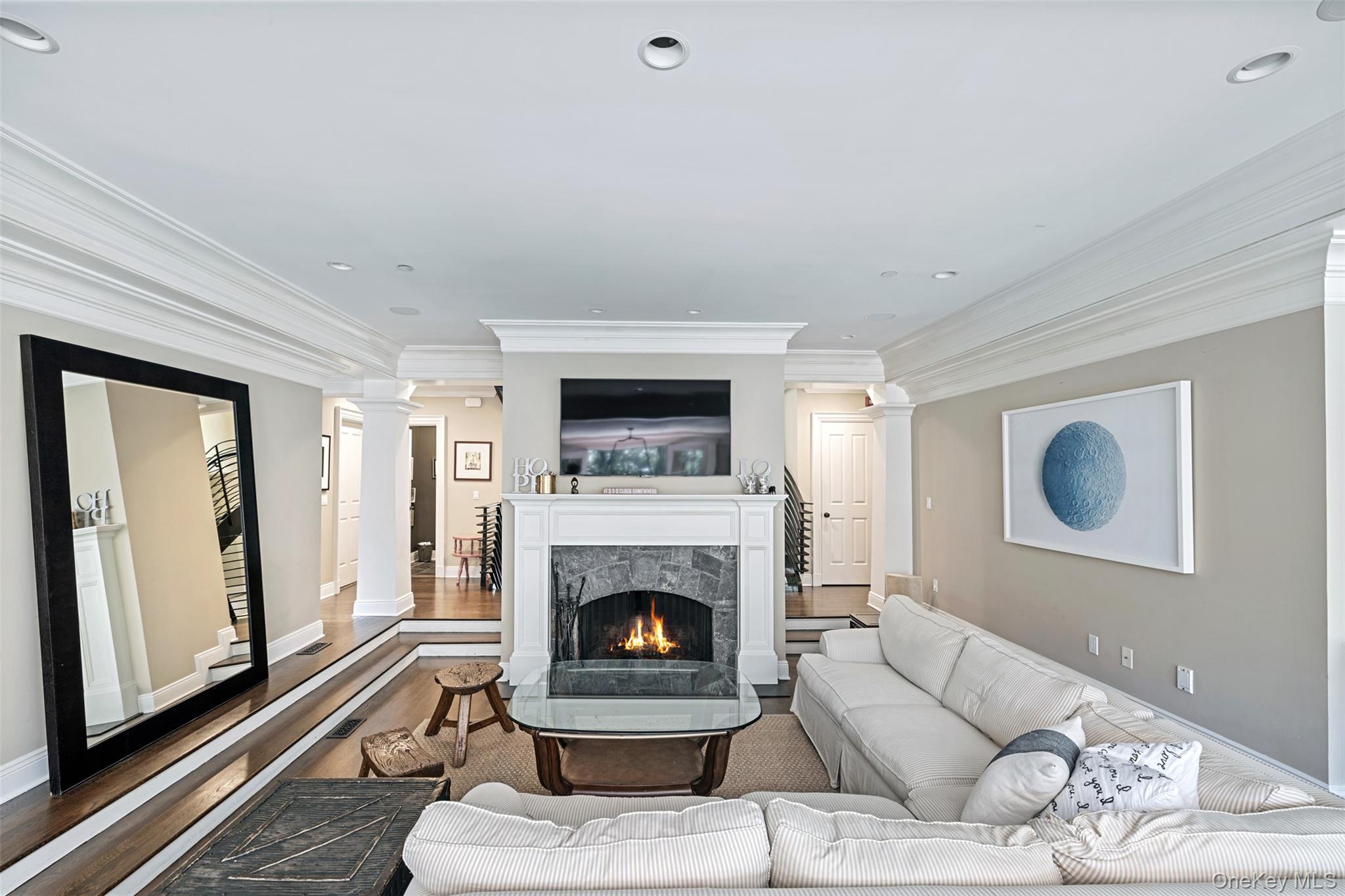 12 Bishop Park Road Pound Ridge, NY 10576 - Photo 8 of 49 a living room with furniture and a fireplace