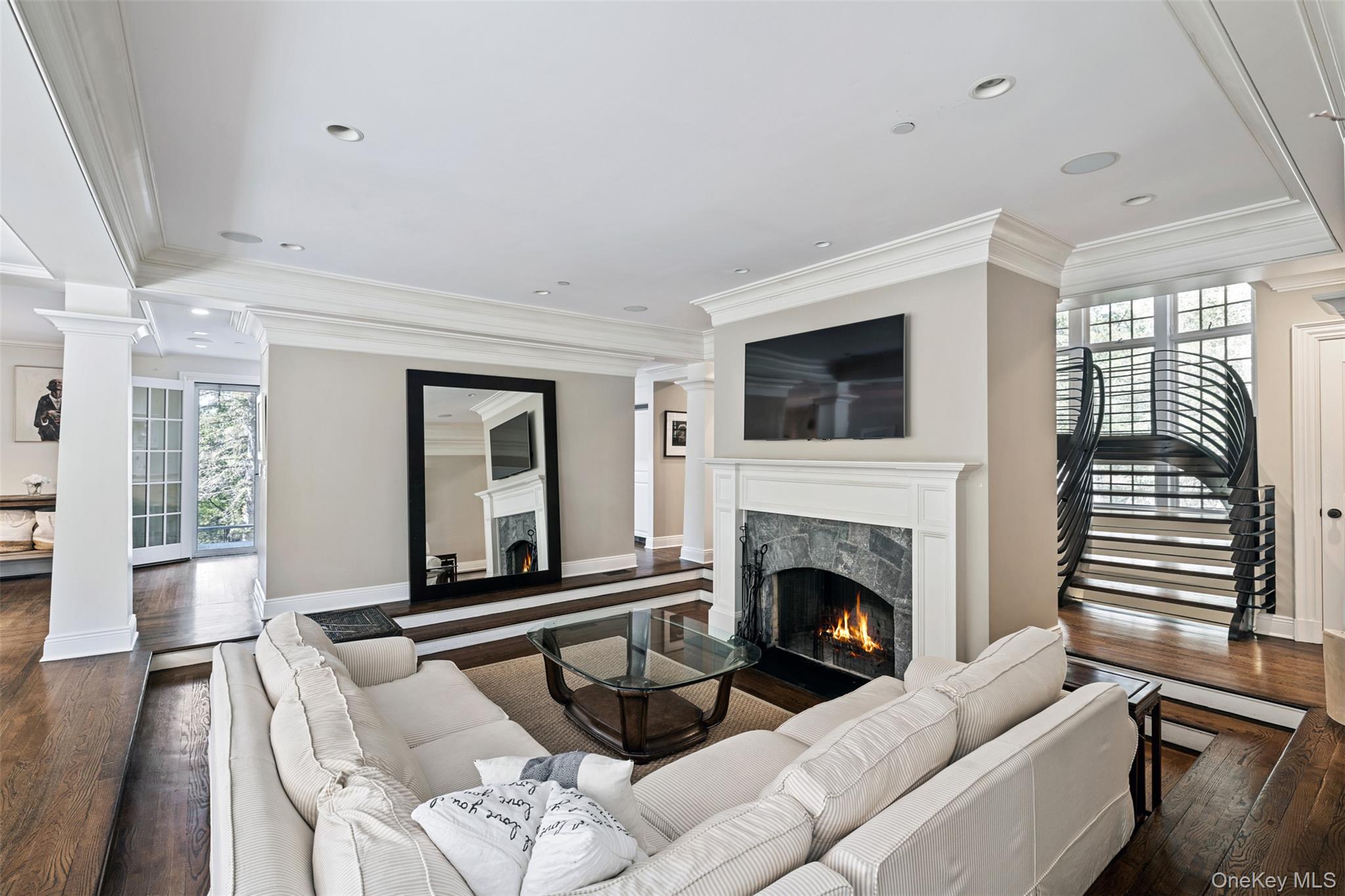 12 Bishop Park Road Pound Ridge, NY 10576 - Photo 10 of 49 a living room with furniture fireplace and flat screen tv