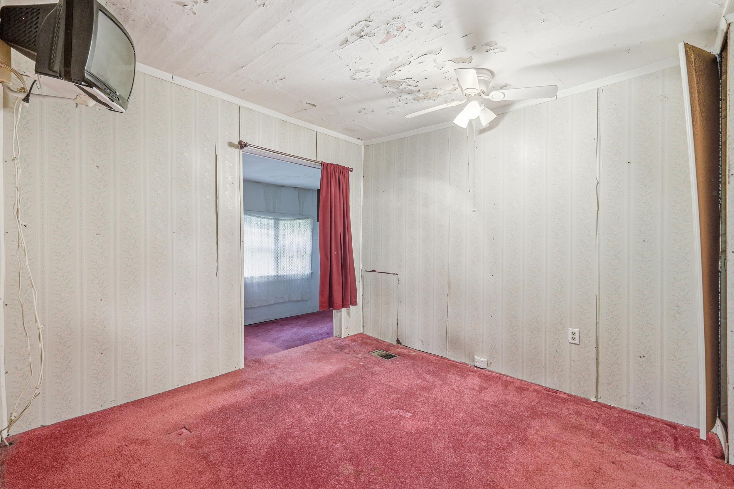 13896 Rockingham Pike Elkton, VA 22827 - Photo 39 of 60 an empty room with a bathroom