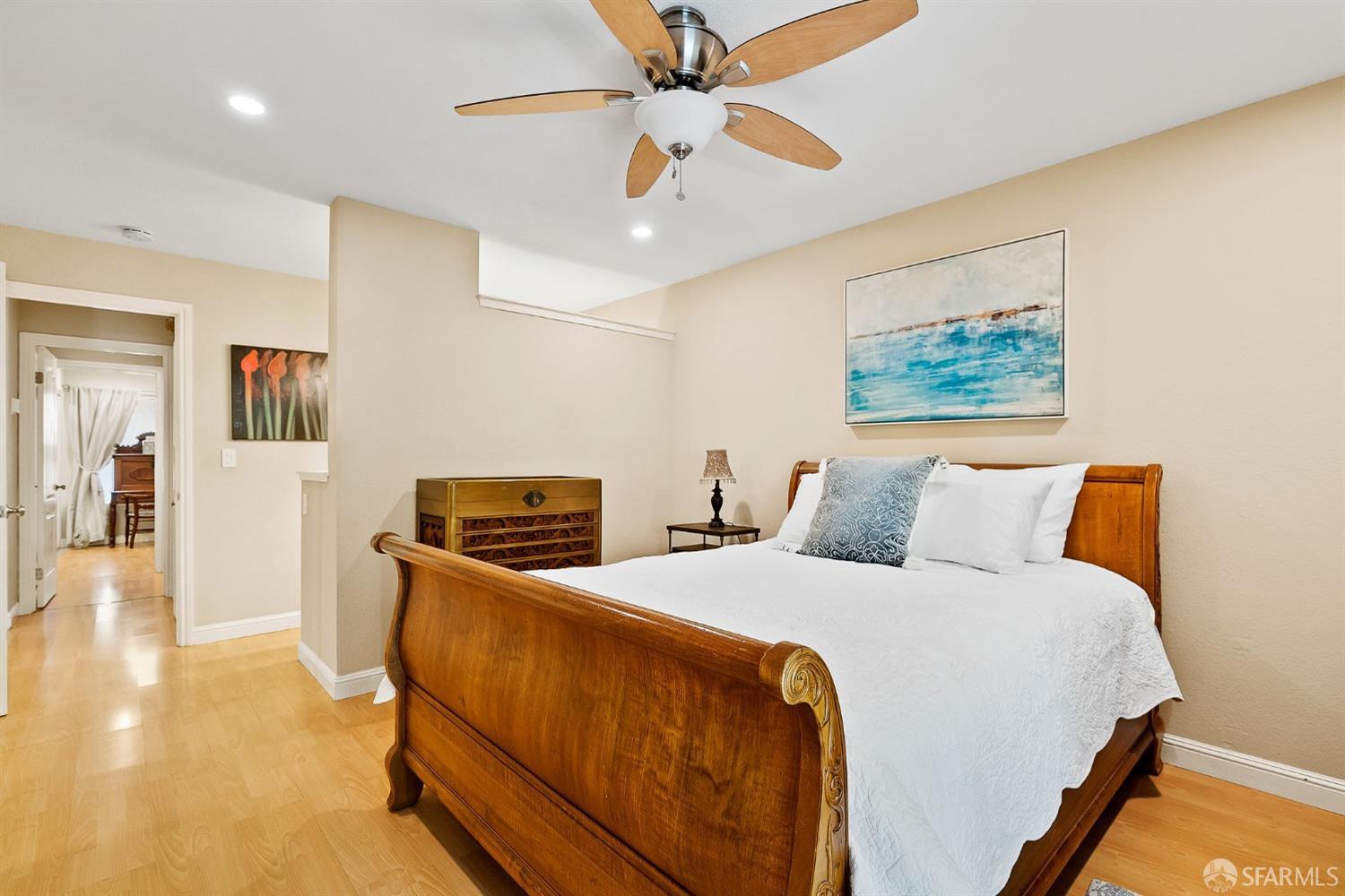 348 Mill Road Martinez, CA 94553 - Photo 12 of 28 a bedroom with a bed and a chandelier