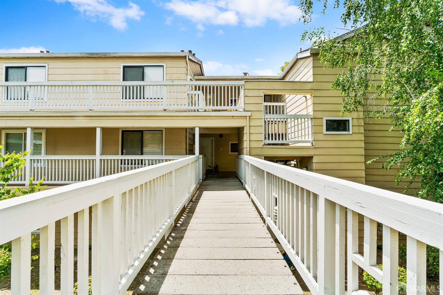 348 Mill Road Martinez, CA 94553 - Photo 24 of 28 a view of a balcony with wooden floor and fence