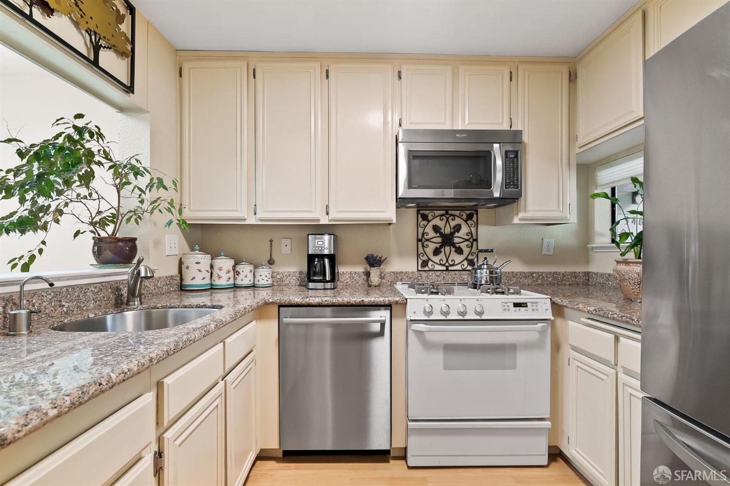 348 Mill Road Martinez, CA 94553 - Photo 5 of 28 a kitchen with a stove microwave and sink