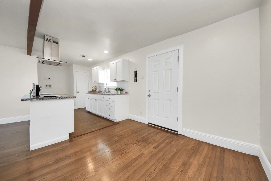 119 Burke Road Pasadena, TX 77506 - Photo 11 of 47 a view of kitchen with wooden floor