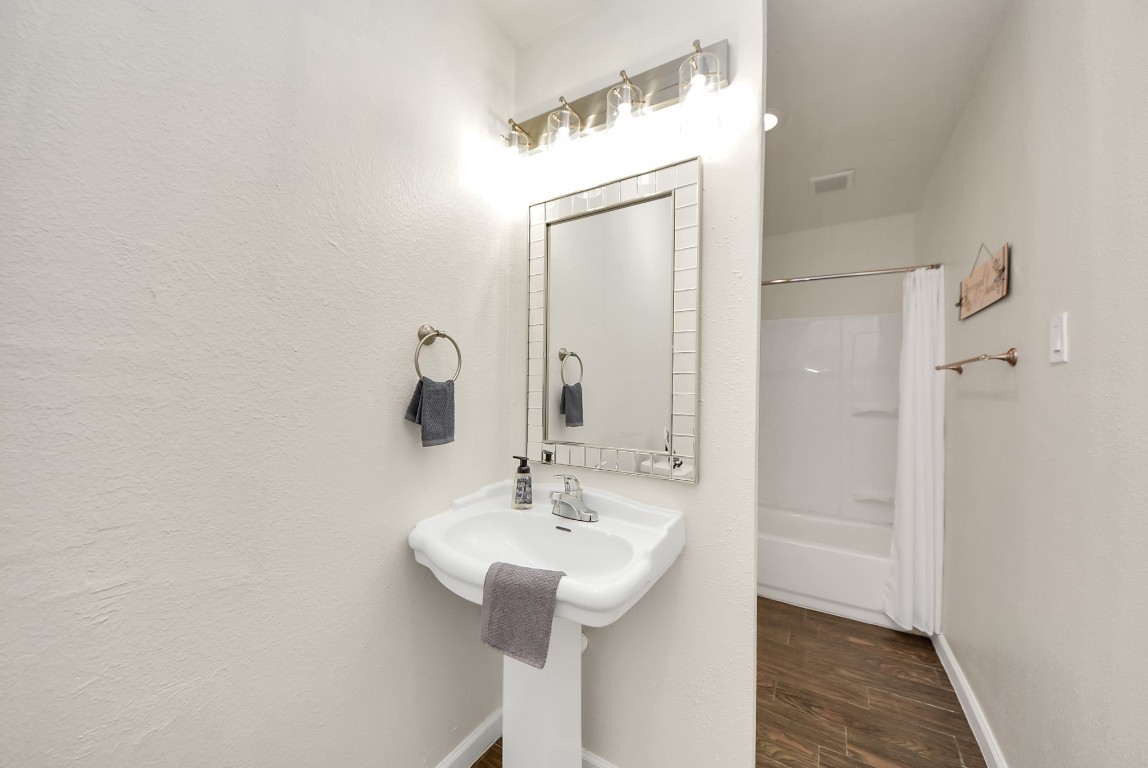119 Burke Road Pasadena, TX 77506 - Photo 24 of 47 a bathroom with a sink and a mirror