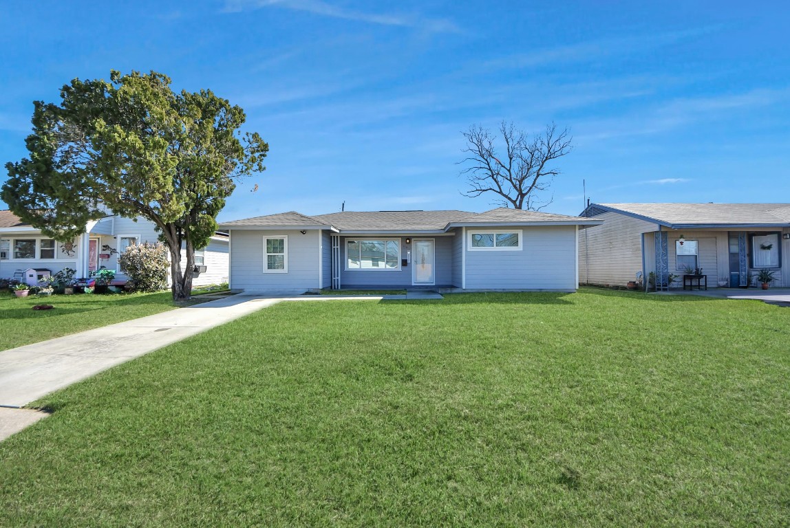 119 Burke Road Pasadena, TX 77506 - Photo 3 of 47 a front view of a house with a garden