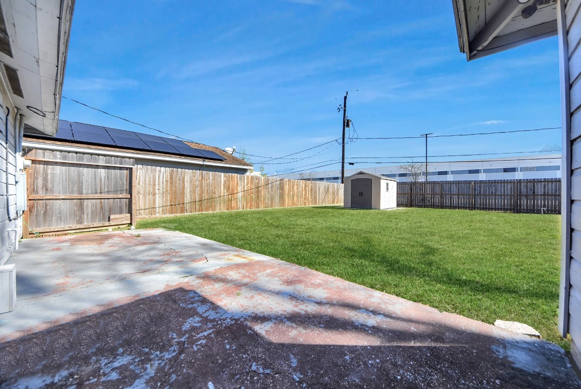 119 Burke Road Pasadena, TX 77506 - Photo 38 of 47 a view of a house with a yard
