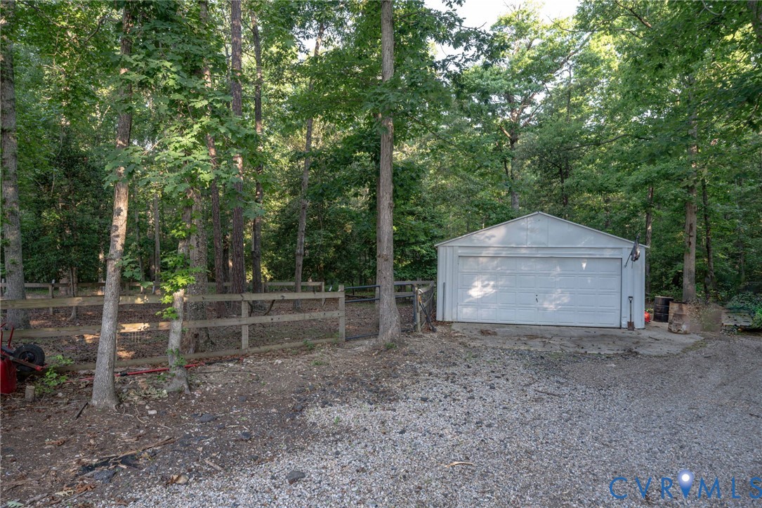 12700 Coalboro Road Chesterfield, VA 23838 - Photo 47 of 50 Detached two-car garage with a gravel driveway, su