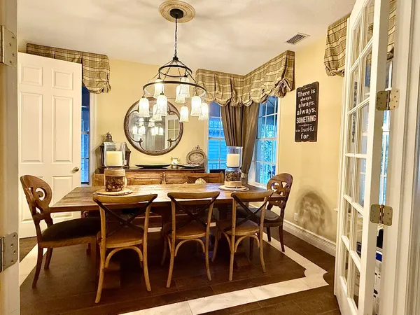 a view of a swimming pool with a patio