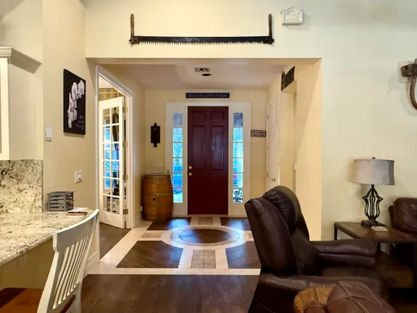 a view of a swimming pool with an outdoor seating