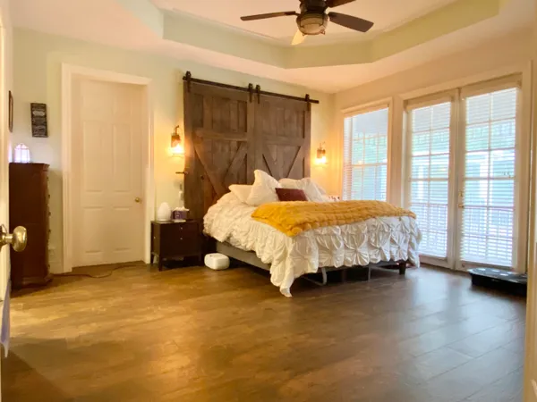 a view of a patio with a table chairs and a patio