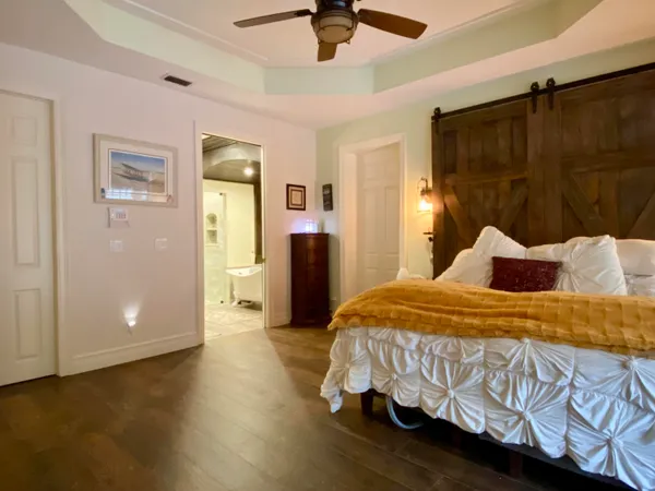 a view of a backyard with a iron fence