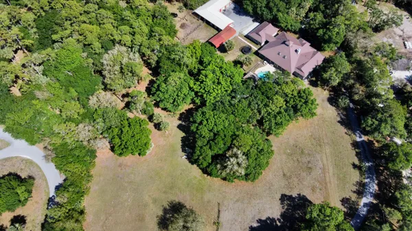 a view of a dining area with furniture window and wooden floor
