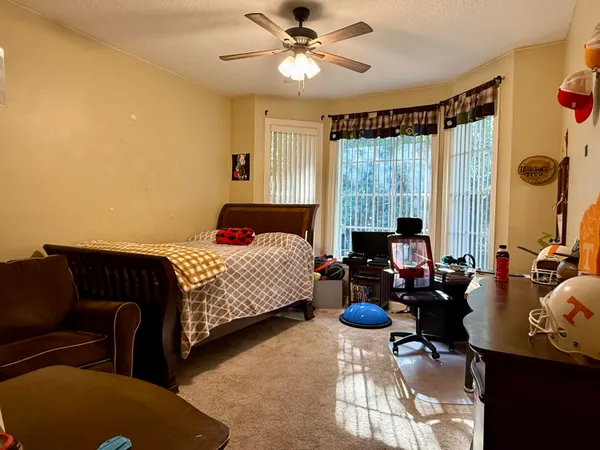 a view of a cafe with sitting area