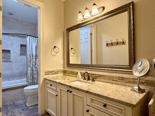 a view of a garage with wooden floors