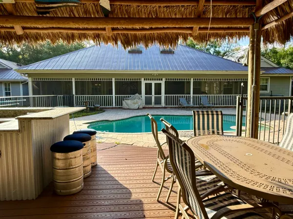 a living room with fireplace furniture and a flat screen tv